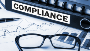 Photo of compliance binder and glasses